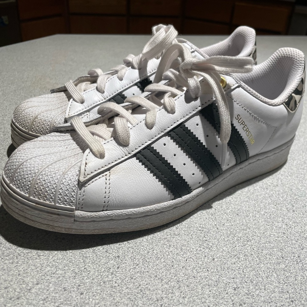 Adidas Superstars, white w/ Black Stripes and Leopard detail, size 7.5